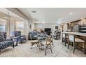 Inviting living room featuring tile flooring, comfortable seating, and an open floor plan at 5202 Willis St, North Las Vegas, NV 89031