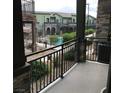 Balcony view of community landscaping and pool area at 6450 Spring Jog St, Las Vegas, NV 89166