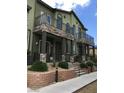 Charming townhome with stone accents and private balconies at 6450 Spring Jog St, Las Vegas, NV 89166