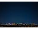 Stunning night skyline view showcasing the city lights and vibrant atmosphere of Las Vegas at 8113 Misty Canyon Ave, Las Vegas, NV 89113
