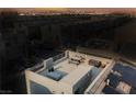 Home rooftop featuring an outdoor dining set and city views at 8113 Misty Canyon Ave, Las Vegas, NV 89113