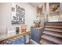 Stylishly decorated staircase leading to the upper level at 8113 Misty Canyon Ave, Las Vegas, NV 89113