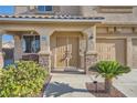 Inviting front porch with double doors and comfortable seating area at 1191 Starstone Ct, Henderson, NV 89014