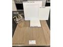 Interior design featuring Executive Oak luxury vinyl plank and Simply White quartz countertops at 128 Silver Run Ln, Las Vegas, NV 89138
