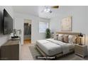 Relaxing bedroom with large bed, modern decor, and ample closet space at 2725 S Nellis Blvd # 1056, Las Vegas, NV 89121