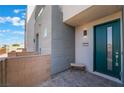Chic townhome featuring a private patio and stylish front door at 4294 Eagle Summit Ave, Las Vegas, NV 89141