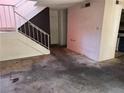 View of the living room with staircase and access to other parts of the home at 4338 Caliente St # 8, Las Vegas, NV 89119