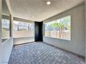 Covered patio with brick flooring and views of the surrounding neighborhood at 483 Fairview Hills St, Las Vegas, NV 89138