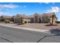 Single-story home featuring a low-maintenance desert landscape at 11032 Mission Lakes Ave, Las Vegas, NV 89134