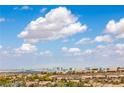 Panoramic city view overlooking rooftops and cityscape with blue sky and clouds at 1964 Oliver Springs St, Henderson, NV 89052