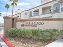 Community sign for Mar-A-Lago showcasing lush landscaping at 3150 Soft Breezes Dr # 1050, Las Vegas, NV 89128