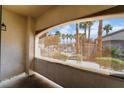View of the community pool area from a covered patio at 5655 E Sahara Ave # 1037, Las Vegas, NV 89142