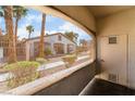 View of the community clubhouse and surrounding landscaping at 5655 E Sahara Ave # 1037, Las Vegas, NV 89142