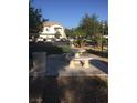 The picnic area features a concrete table and seats, surrounded by landscaping at 5655 E Sahara Ave # 1037, Las Vegas, NV 89142