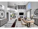 Open floor plan showcasing the living and dining areas with elegant furnishings at 281 Powerbilt Ave, Las Vegas, NV 89148