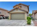 Charming two-story home featuring a spacious two-car garage and manicured landscaping at 4008 Lighthouse Ave, Las Vegas, NV 89110