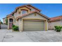 Charming two-story home featuring a spacious two-car garage and manicured landscaping at 4008 Lighthouse Ave, Las Vegas, NV 89110