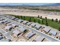 View of new development featuring modern homes, landscaping and a golf course under construction at 4356 E Cactus Canyon Dr, Pahrump, NV 89061
