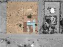 An aerial view of the property showing the layout of the home and surrounding land at 5085 Raven Ave, Las Vegas, NV 89139