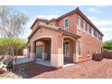 Well-maintained house features a portico leading to the entrance and a convenient attached two-car garage at 5852 Clear Haven Ln, North Las Vegas, NV 89081