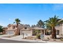 Beautiful single-Gathering home with desert landscaping, two-car garage, and well-maintained facade at 688 Castlebridge Ave, Las Vegas, NV 89123