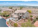 Beautiful two-story home with mountain views and well-maintained landscaping at 7756 River Mist Ct, Las Vegas, NV 89113