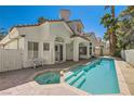 Inviting backyard pool and spa area with well-maintained landscaping offering a private oasis at 8124 Bay Harbor Dr, Las Vegas, NV 89128