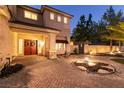 Beautiful home featuring a brick driveway, meticulously landscaped entrance, and a covered porch at , Las Vegas, NV 89131
