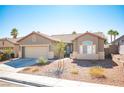 Charming single-story home with a well-maintained front yard and a spacious two-car garage at 11119 River Hills Ln, Las Vegas, NV 89135