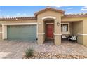 Charming home featuring a well-maintained lawn and a cozy porch perfect for relaxation at 2213 Chandler Ranch Pl, Laughlin, NV 89029