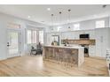 Charming kitchen with a breakfast bar, stainless appliances, and ample natural light, perfect for Gathering meals at 2353 Lauren Dr, Las Vegas, NV 89134