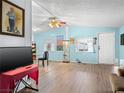 Spacious living room featuring hardwood floors, natural light, and neutral walls ready for personal touches at 240 Navajo Dr, Henderson, NV 89015
