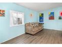 Comfortable living room featuring a cozy sofa and a serene atmosphere perfect for relaxation at 240 Navajo Dr, Henderson, NV 89015