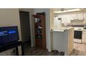 Cozy kitchen with white appliances and cabinets adjacent to the living area at 3550 Bay Sands Dr # 3051, Laughlin, NV 89029