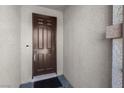 Welcoming entryway featuring a stylish front door and textured walls for added character at 3556 Valley Lily St, North Las Vegas, NV 89032