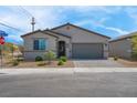 Charming single-story home with a well-manicured front yard and inviting curb appeal at 3556 Valley Lily St, North Las Vegas, NV 89032