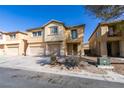 Charming two-story home featuring a three-car garage and desert landscaping at 3774 Dusky Flycatcher St, Las Vegas, NV 89122