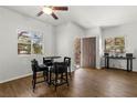 Cozy dining area featuring a round table with four chairs and natural light at 5250 S Rainbow Blvd # 2106, Las Vegas, NV 89118
