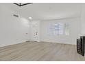 Clean and bright living room showcasing fresh paint, new floors, and modern upgrades at 540 Kelsford Dr, Las Vegas, NV 89123