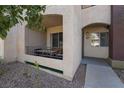 Condo with covered patio featuring seating and walkway leading to entrance at 7885 W Flamingo Rd # 1161, Las Vegas, NV 89147