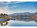 Beautiful lake view home featuring luxury lakeside real estate in a scenic and serene setting at 15 Via Mantova # 401, Henderson, NV 89011