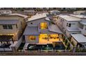 Aerial view of a modern home with a pool, spa, outdoor kitchen, and patio seating at 436 Crown Mesa Ave, Las Vegas, NV 89138