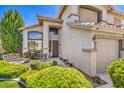 Charming front entrance with seating, manicured landscaping, and a stylish exterior at 6301 Citrine Ave, Las Vegas, NV 89130