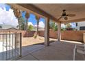 Spacious covered patio with ceiling fan, perfect for outdoor living and entertaining at 7870 Midnight Ride St, Las Vegas, NV 89131