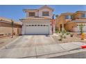 Charming two-story home featuring a well-maintained front yard with xeriscape landscaping at 2180 Polynesia Cir, Henderson, NV 89074