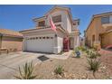 Charming two-story home featuring a well-maintained front yard with xeriscape landscaping at 2180 Polynesia Cir, Henderson, NV 89074