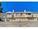 Multiple garage units offer convenient parking and storage in a multi-unit condo building with balconies at 2633 S Durango Dr # 201, Las Vegas, NV 89117