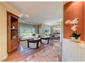 Bright living and dining areas boasting hardwood floors, stylish furnishings, and plenty of natural light at 2702 Grand Forks Rd, Henderson, NV 89052