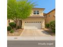 Charming two-story home featuring a well-maintained front yard and a spacious two-car garage at 3440 Bella Viera Ct, Las Vegas, NV 89141