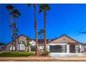 Charming single-Gathering home with well-maintained landscaping, desert plants, and multi-car garage at 1144 Calico Ridge Dr, Henderson, NV 89011